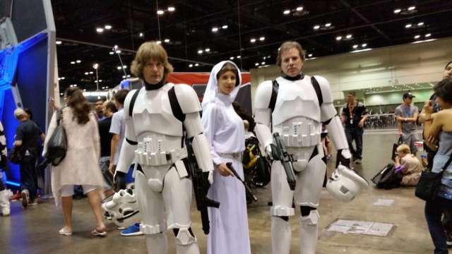 Awesome Luke, Leia and Han cosplay.  They're not short for Stormtroopers.  Haha!